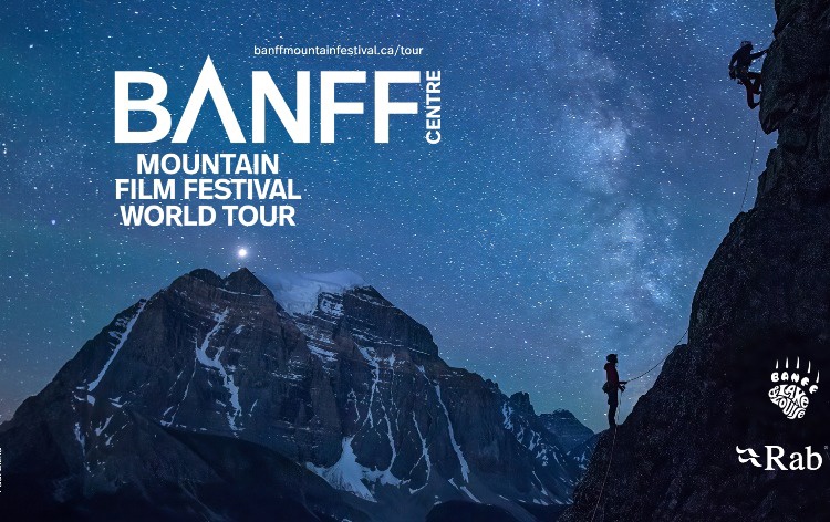 Event flier for the Banff Centre Mountain Film Festival World Tour. The background features a breathtaking night sky filled with stars and the Milky Way over a rugged, snow-dusted mountain range. Two rock climbers are silhouetted against a steep cliff face. Text details the event: October 26 - December 1, 2024 (World Tour dates) in Banff, Alberta, with a "Get Tickets Now" call to action. Logos for Banff Centre, Banff Lake Louise, and Rab are visible at the bottom.