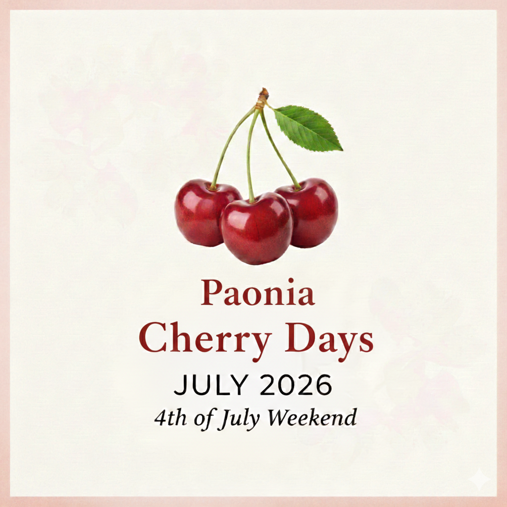 a promotional image with red cherries on a cream colored background and the word Paonia Cherry Days July 2026 4th of July Weekend