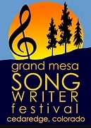 Logo for the Grand Mesa Songwriter Festival in Cedaredge, Colorado. The top half of the image features a large orange sun setting behind a dark blue mountain silhouette and three evergreen trees, with a black musical treble clef positioned to the left. Below the horizon line, the text reads "grand mesa SONG WRITER festival" in gold and white, followed by "cedaredge, colorado" at the bottom.