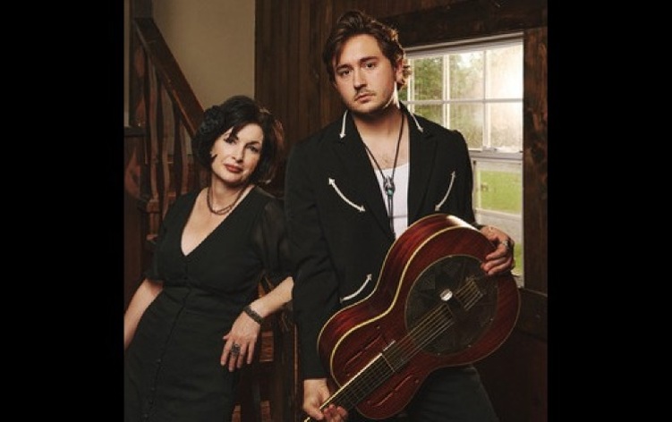 Concert promotional graphic for A Tale of Two. Features a duo in a retro style. May 7, 2026, at 7 PM, Delta Egyptian Theater. Americana and blues storytelling. $27.30 tickets.