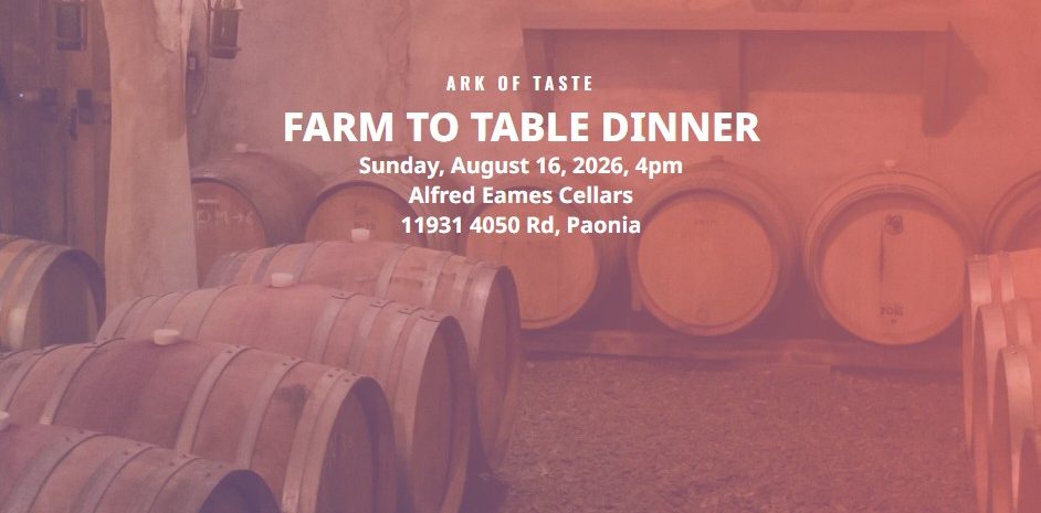 Event poster for the Ark of Taste Farm to Table Dinner on Sunday, August 16, 2026, at 4 PM at Alfred Eames Cellars in Paonia. Background shows candlelit wine aging barrels inside a rustic cellar.